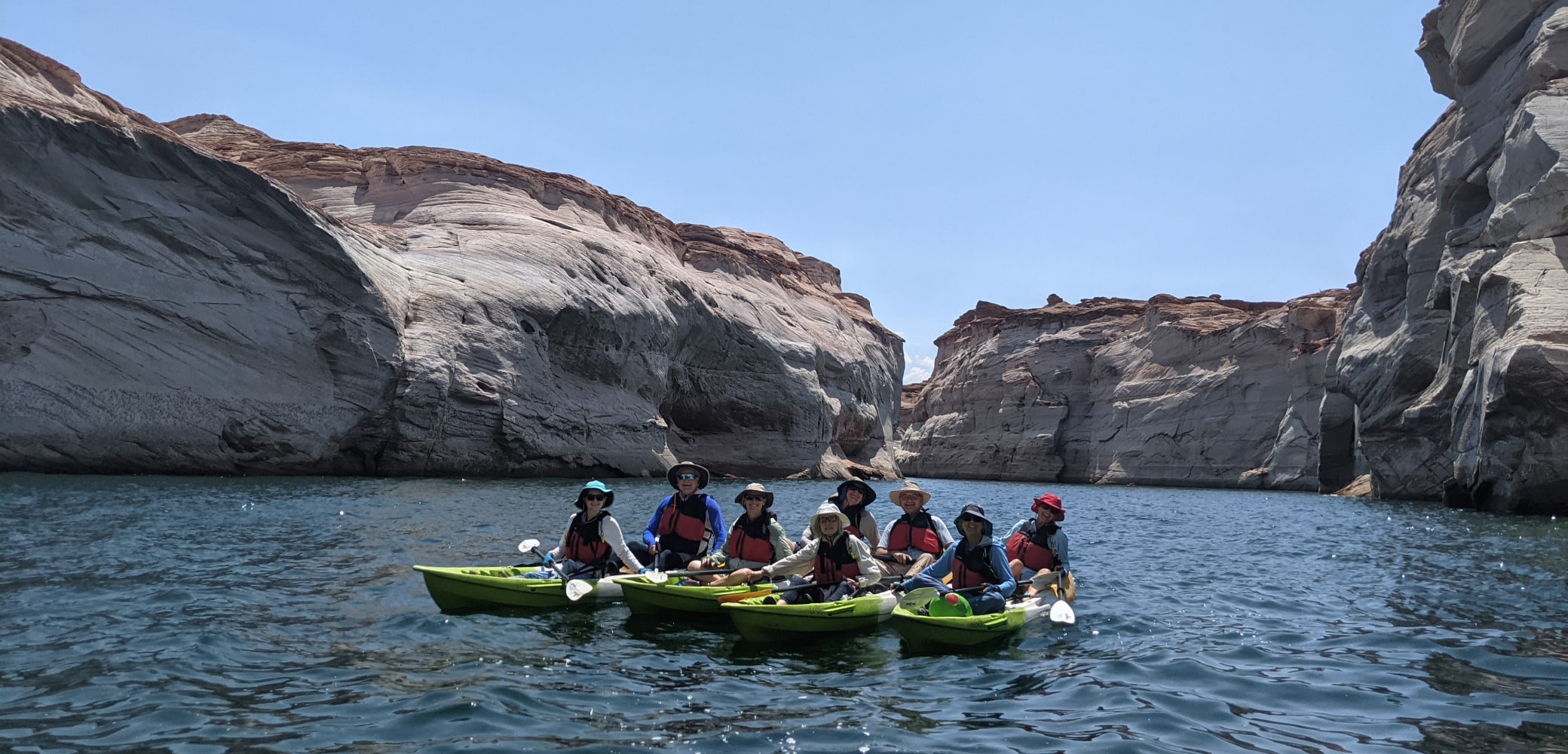 group of people kayaking in labyrinth canyon on lake powell