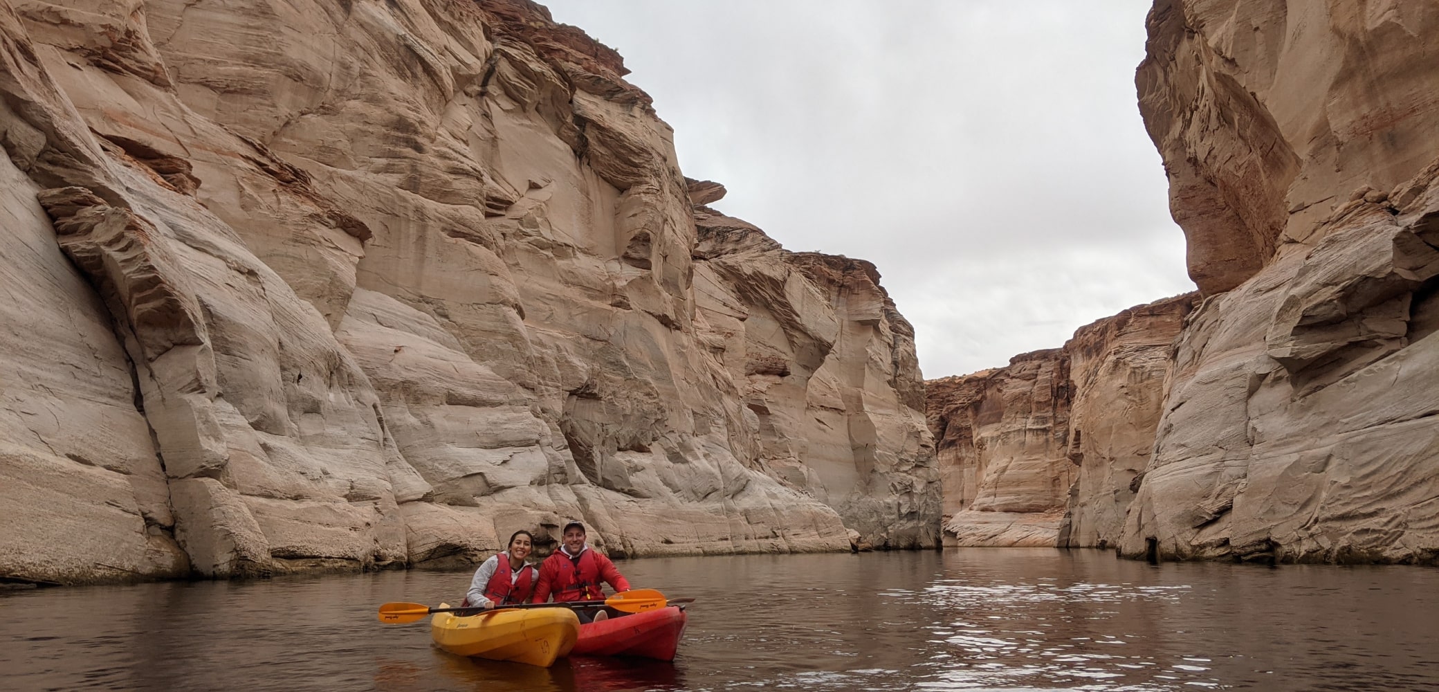 two people kayaking in labyrinth canyon in lake powell