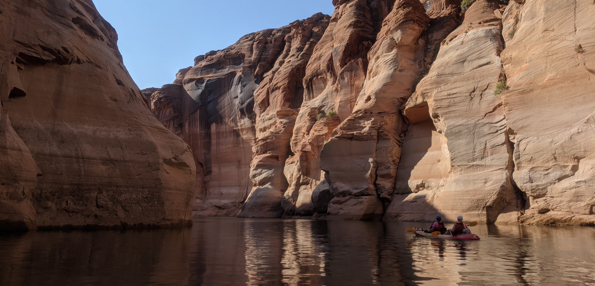 kayaking deep into lake powell on a multi day camping trip